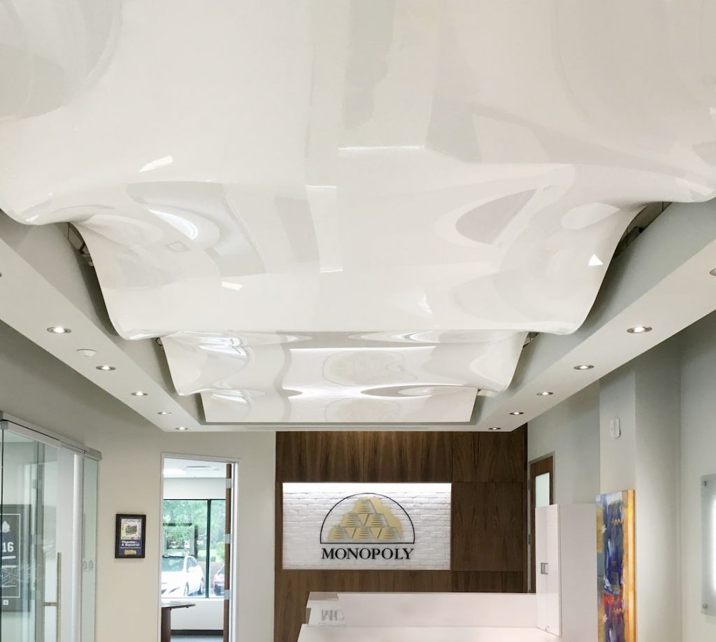multilevel-waved-reflective-white-glossy-stretch-ceiling-in-monopoly-1024x918.jpg